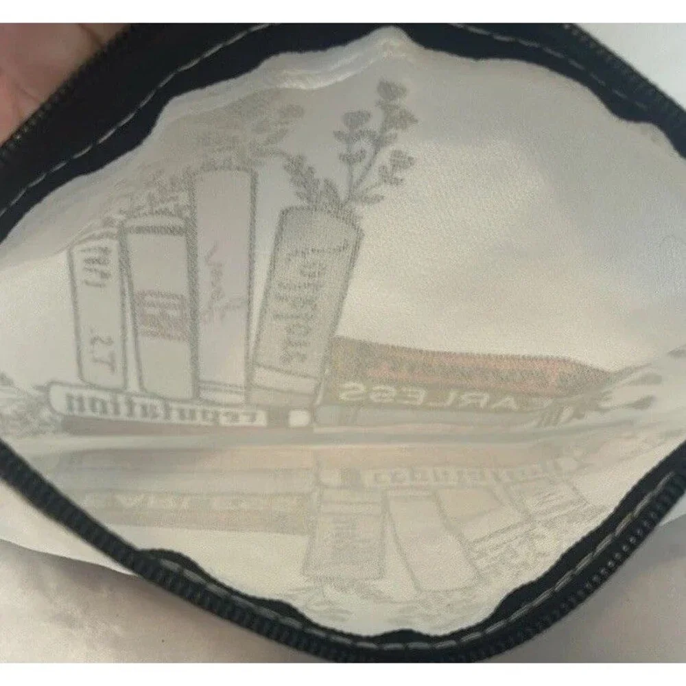White and Black Cosmetic Bag with Books Design